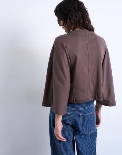 Model wearing Super wide sleeve tee in chocolate