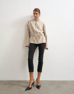 Model wearing Supersoft button down tie detail jacket in oat