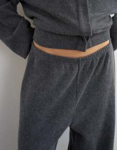 Model wearing Supersoft pleated wide leg joggers in charcoal