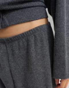 Model wearing Supersoft pleated wide leg joggers in charcoal