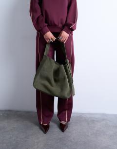 Model wearing Suri real suede leather shoulder bag in khaki