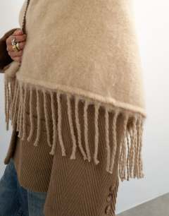 Model wearing Susan fringe scarf in beige