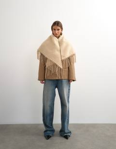 Model wearing Susan fringe scarf in beige