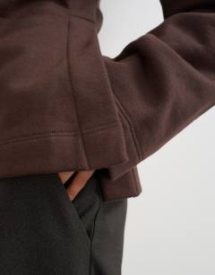 Model wearing Sweat crew neck cinched jumper in chocolate