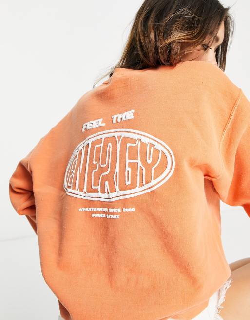 Topshop - Sweater in vintage stijl met 'Feel The Energy' in oranje