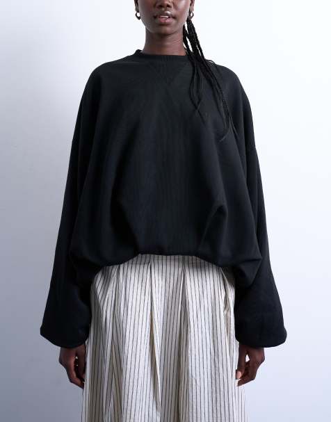 Topshop – Sweatshirt in Schwarz mit Ballonsaum - view 1