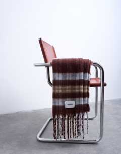 Model wearing Sydney blanket scarf in choc check