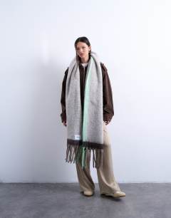 Model wearing Sydney blanket scarf in chocolate and mint