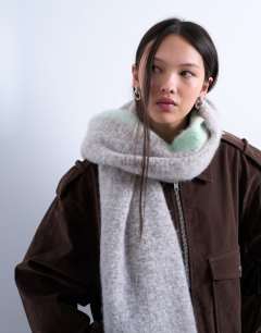 Model wearing Sydney blanket scarf in chocolate and mint