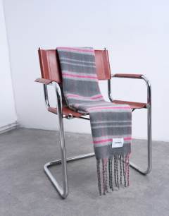 Model wearing Sydney blanket scarf in grey & pink check