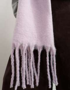 Model wearing Sydney blanket scarf in lilac