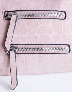 Model wearing Sydney pocket shoulder bag in dusty pink