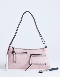 Model wearing Sydney pocket shoulder bag in dusty pink