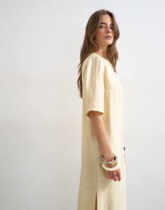 Model wearing T-shirt maxi dress in washed lime