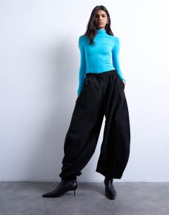 Model wearing Tab detail oversized balloon trouser in black
