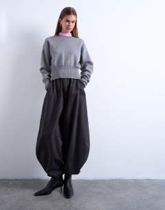 Model wearing Tab detail oversized balloon trouser in brown