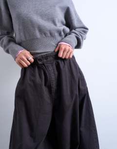 Model wearing Tab detail oversized balloon trouser in brown