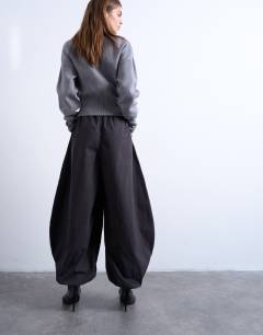 Model wearing Tab detail oversized balloon trouser in brown