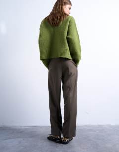 Model wearing Tab detail slouchy wide leg trouser in olive