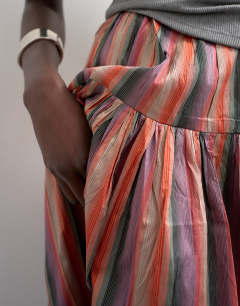 Model wearing Taffeta full hem maxi skirt in multi stripe