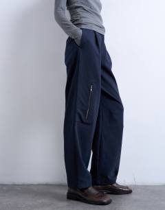 Model wearing Tailored barrel leg cargo trouser in navy