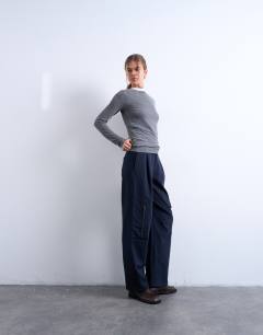 Model wearing Tailored barrel leg cargo trouser in navy