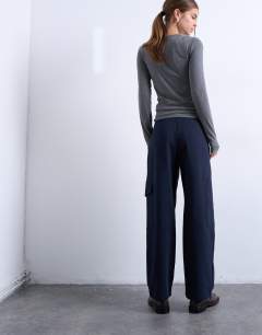 Model wearing Tailored barrel leg cargo trouser in navy