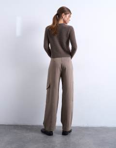 Model wearing Tailored barrel leg cargo trouser in taupe