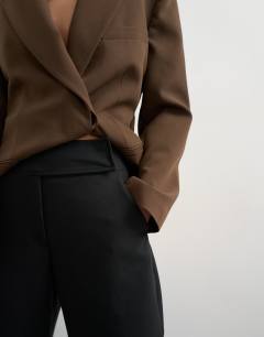 Model wearing Tailored barrel trouser in black