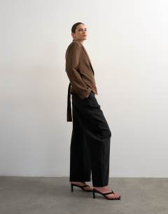 Model wearing Tailored barrel trouser in black