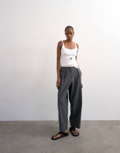 Model wearing Tailored cargo trouser in charcoal