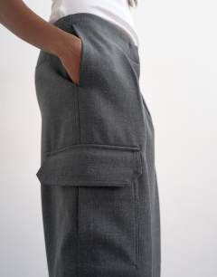 Model wearing Tailored cargo trouser in charcoal