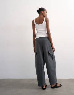 Model wearing Tailored cargo trouser in charcoal