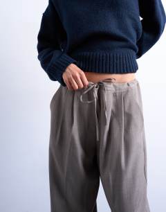 Model wearing Tailored drawstring waist jogger in neutral