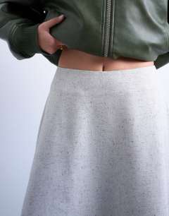 Model wearing Tailored full circle a line maxi skirt in grey