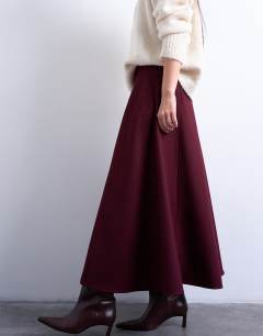 Model wearing Tailored full circle a line maxi skirt in port royal