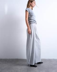 Model wearing Tailored horseshoe leg trouser in grey