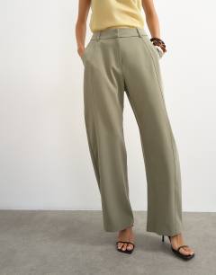 Model wearing Tailored horseshoe trouser in sage