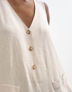 Model wearing Tailored linen jumpsuit in neutral