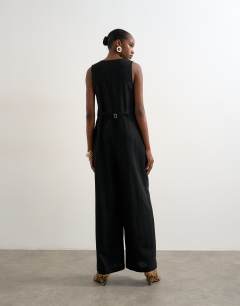 Model wearing Tailored linen jumpsut in black