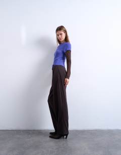 Model wearing Tailored pleated balloon trouser in charcoal