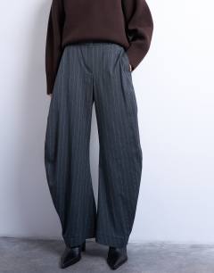 Model wearing Tailored stripe barrel leg trouser in grey