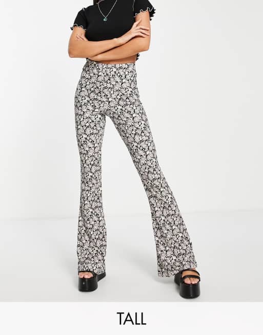 Topshop Tall crinkle flared pants in floral print