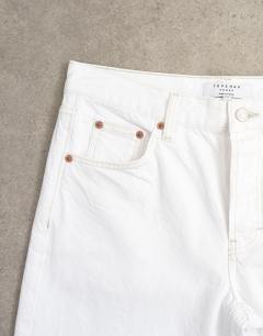 Model wearing Tall Ember low rise straight jean in white