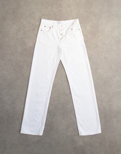 Model wearing Tall Ember low rise straight jean in white