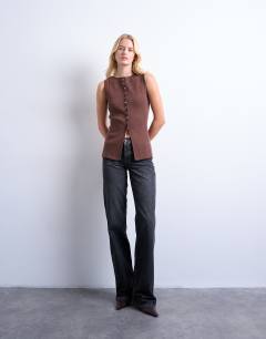 Model wearing Tall Ember low rise straight leg jean in washed black