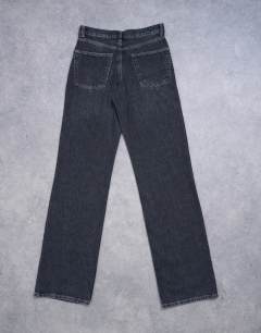 Model wearing Tall Ember low rise straight leg jean in washed black
