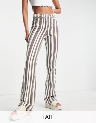 Topshop Tall high waist stripe print flared trouser with front pockets in chocolate