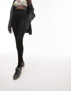 Model wearing Tall high waisted legging in black