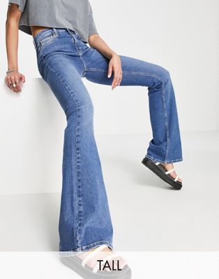 Topshop Tall Jamie flare jeans in mid blue